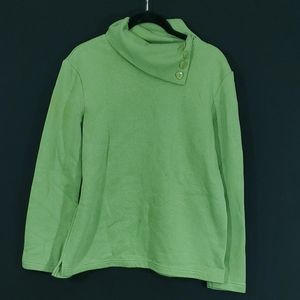 Split neck sweater with decorative buttons